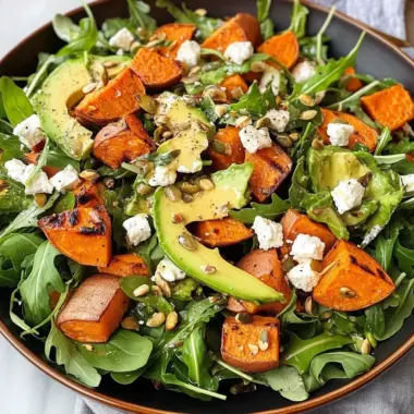 Roasted Sweet Potato & Arugula Salad with Tahini Dressing