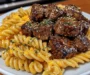 Honey Garlic Velveeta Steak Bites with Cheesy Twisted Pasta