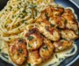 Lemon garlic butter chicken served with creamy parmesan linguine