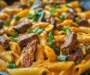 Skillet Creamy Spicy Cajun Steak & Cheddar Pasta